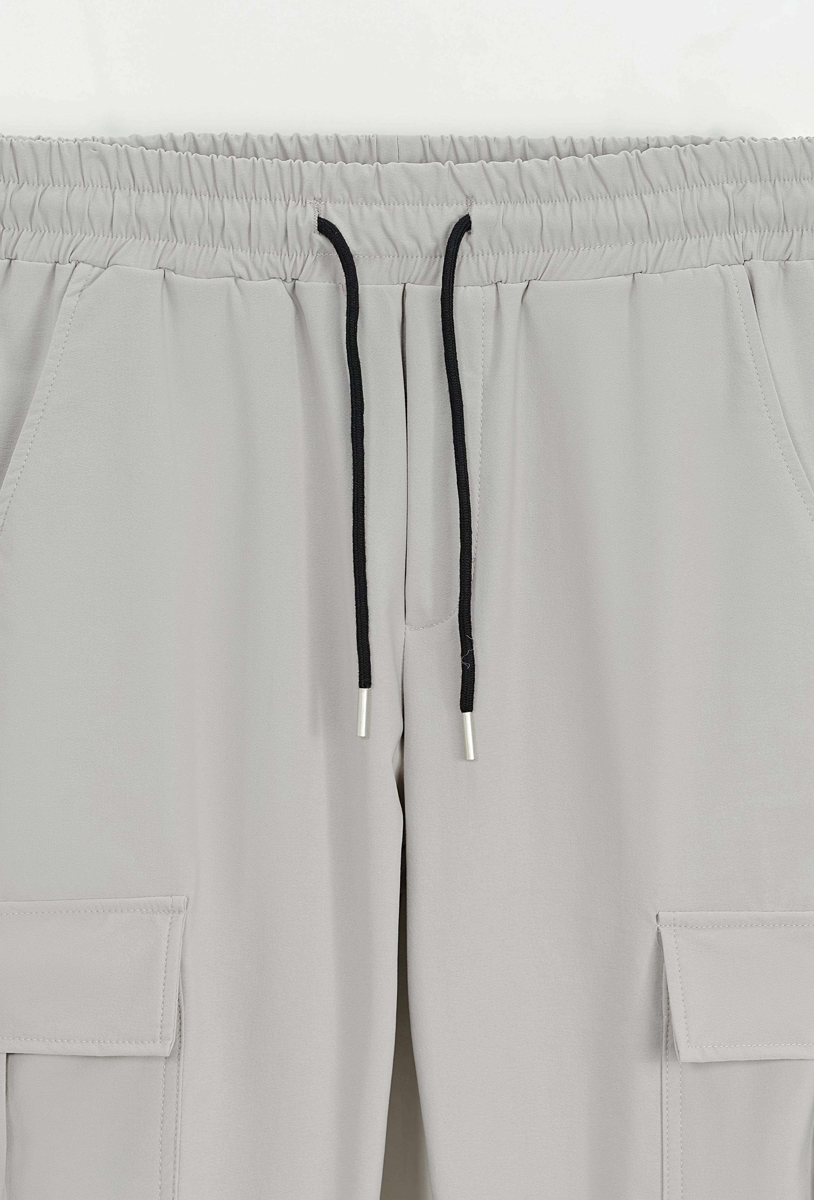 Adjustable pants with drawstring at the waist