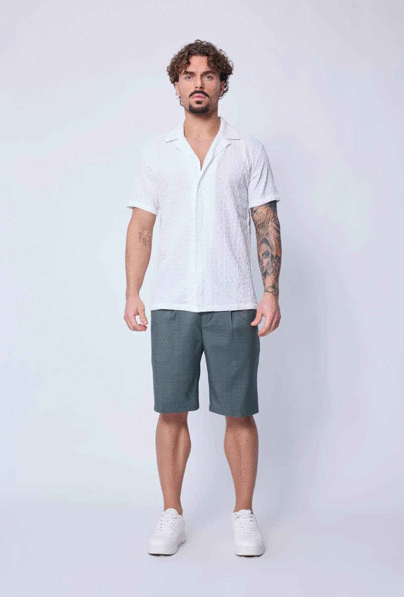 Plain short-sleeved shirt with geometric patterns