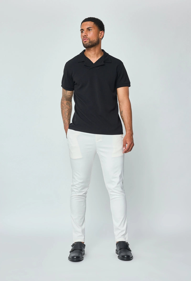 Urban chic plain pants. zipper and asymmetrical button closure