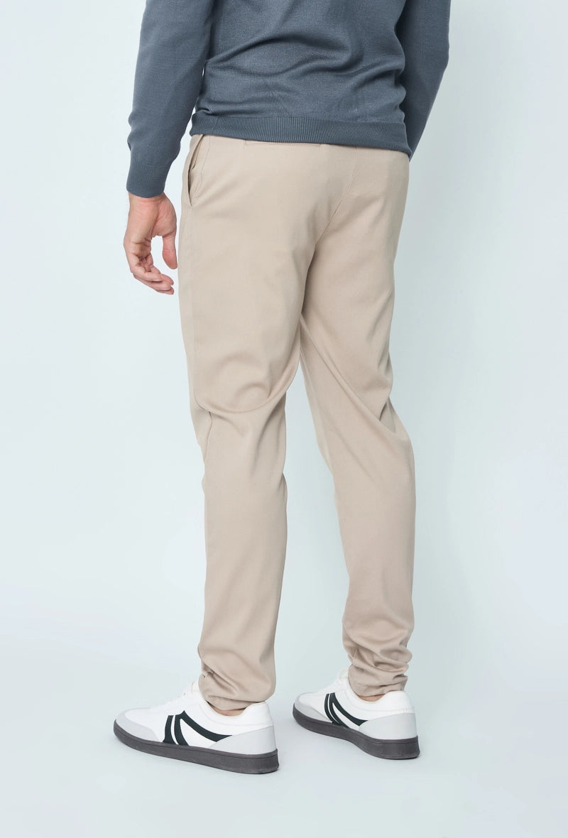 Urban chic plain pants. zipper and asymmetrical button closure