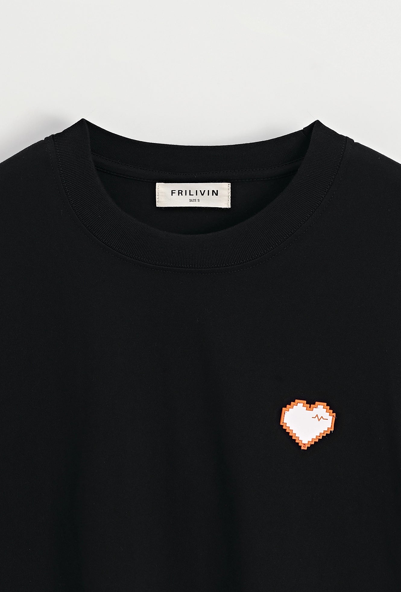 T-shirt uni à coeur