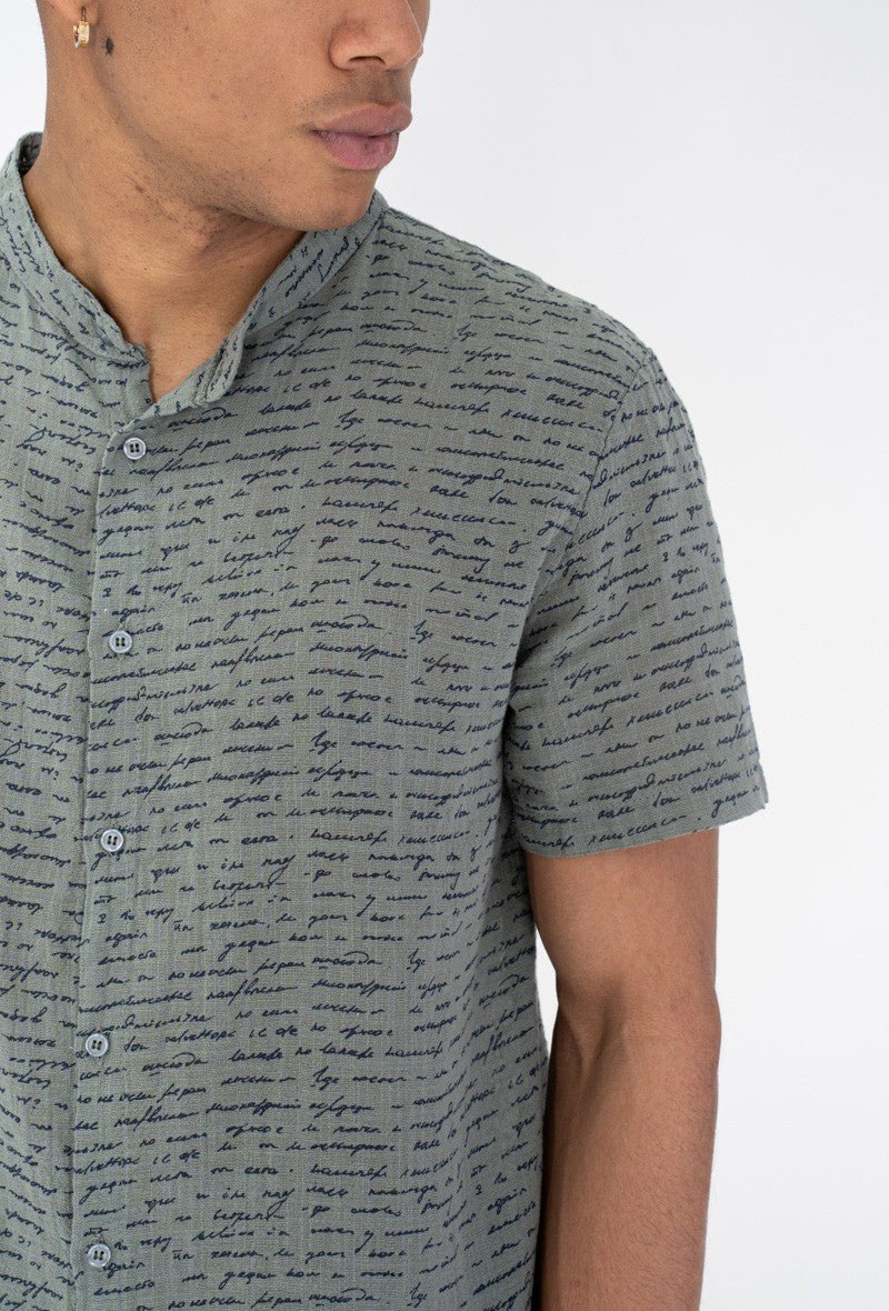 Chemise manches courtes à motif écriture - Frilivin